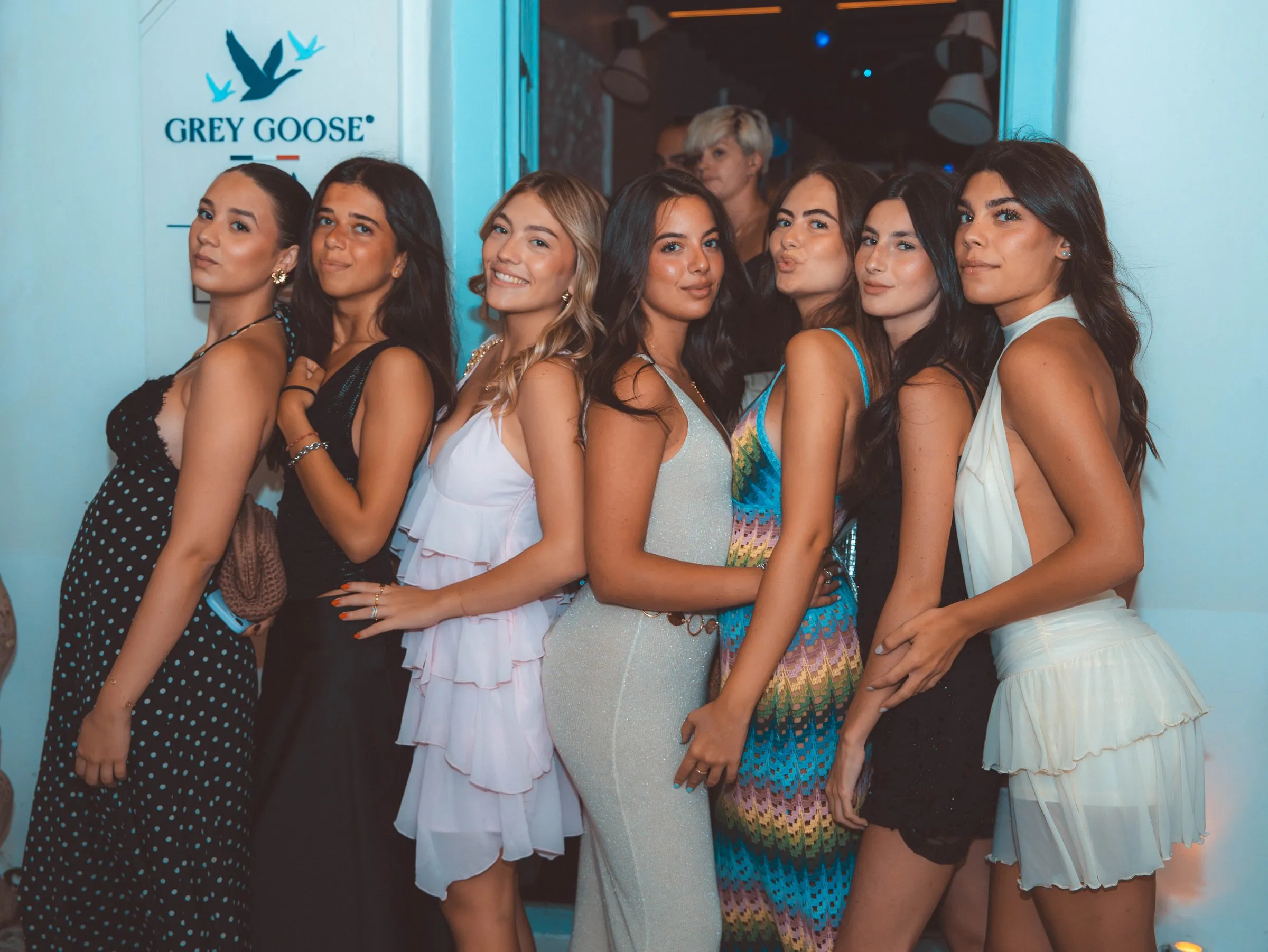 A large group of guests dressed up for a celebration at BAO'S