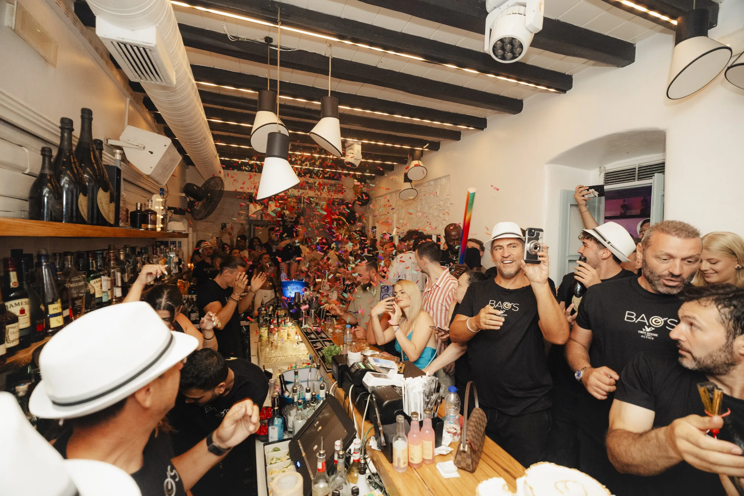 Confetti falling over the bar at BAO'S during a celebration