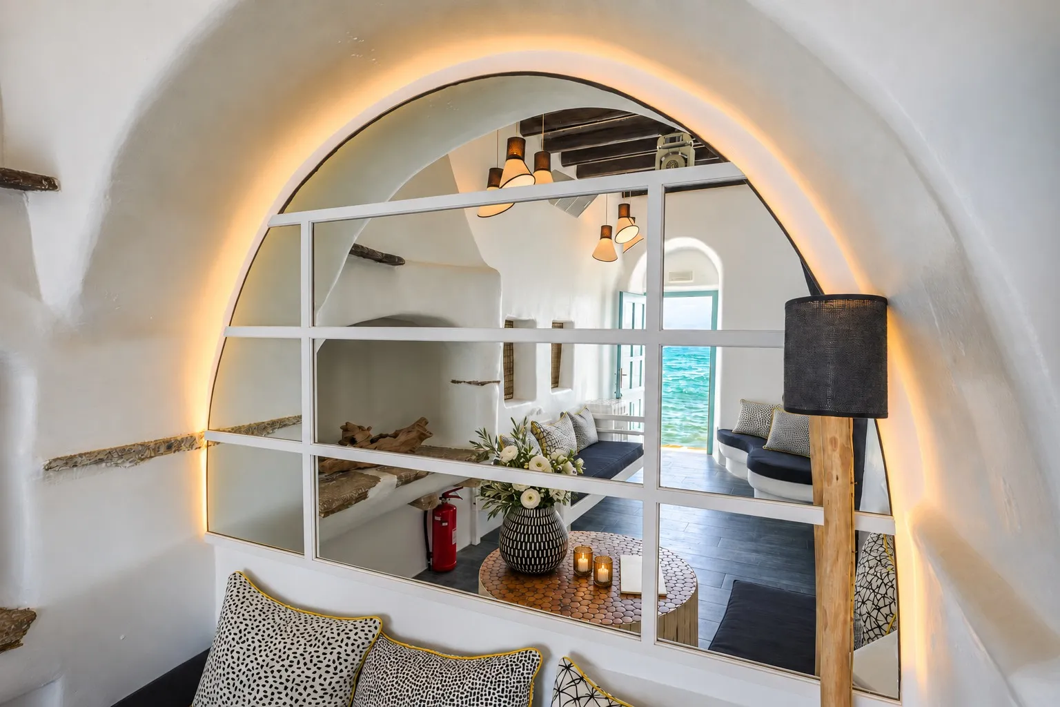 The Room at BAO'S, a private whitewashed room with a double door opening onto the water of Little Venice
