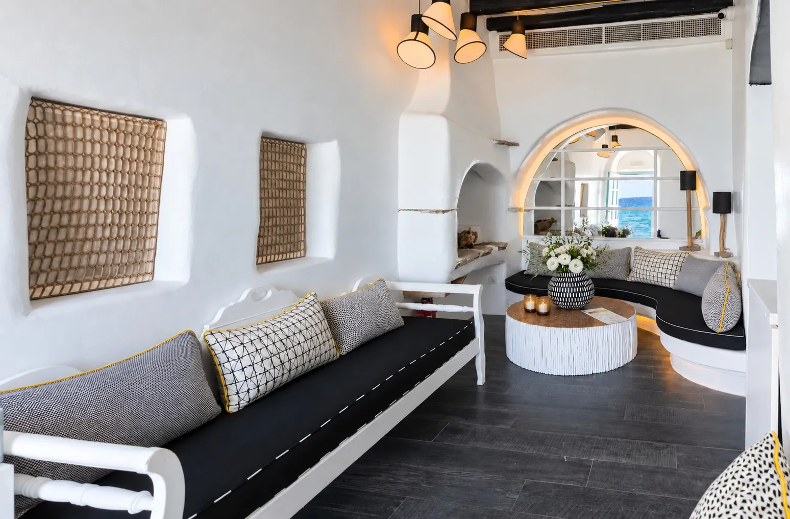 The Room at BAO'S, a private whitewashed room with a double door opening onto the water of Little Venice